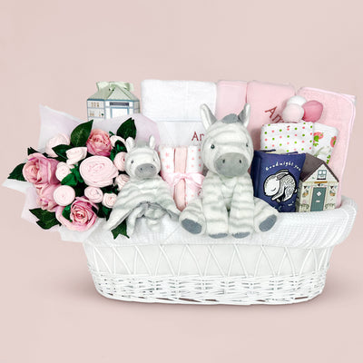 Personalised New Baby Girl Hamper With Soft Zebra Soft Toys And Moses Basket In Pink