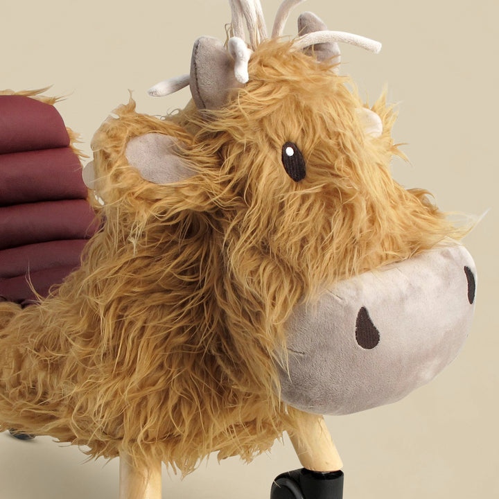 Little Bird Told Me Hubert Highland Cow Ride On Toy