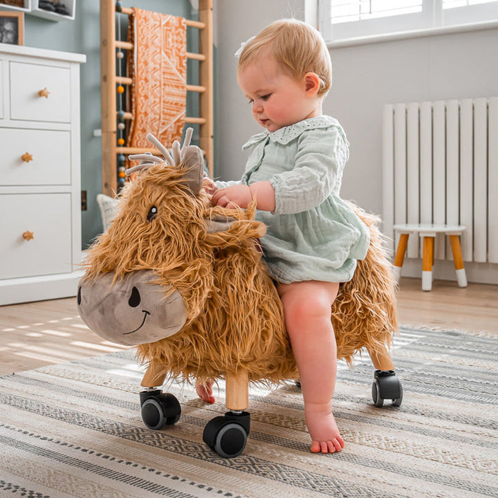 Little Bird Told Me Hubert Highland Cow Ride On Toy