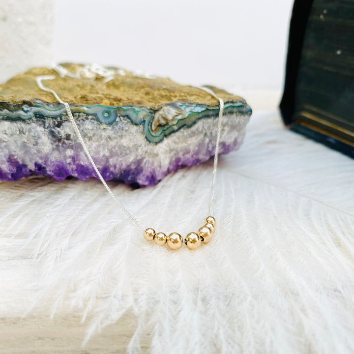 MayaH Jewellery Seven Gold Beads Necklace